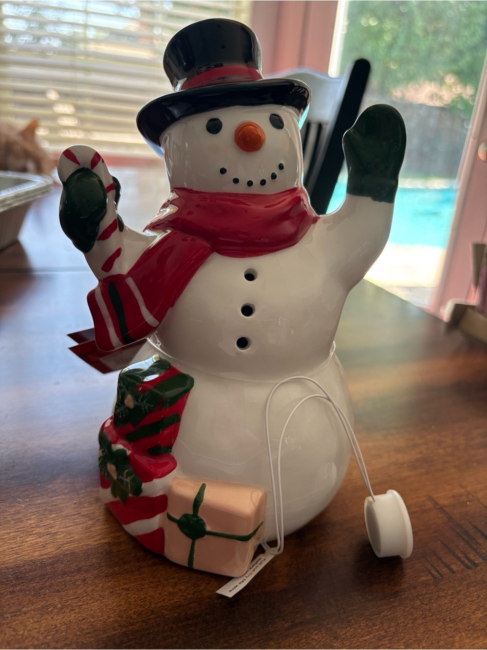 LED Ceramic White Snowman Holiday Figurine with Red Scarf and Green Accents